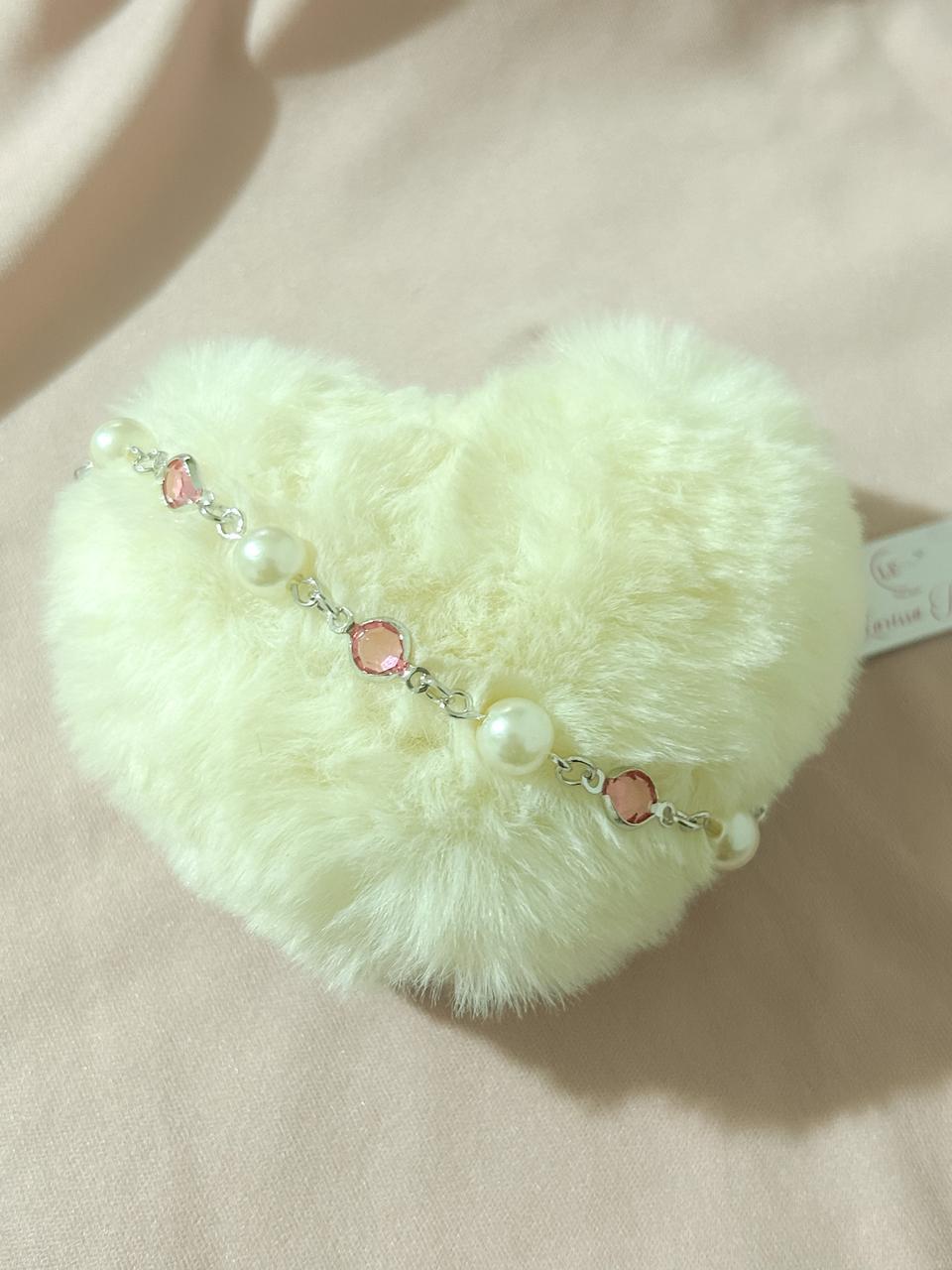 Pulseira perolas e pedras rosas Descrição: Não há.