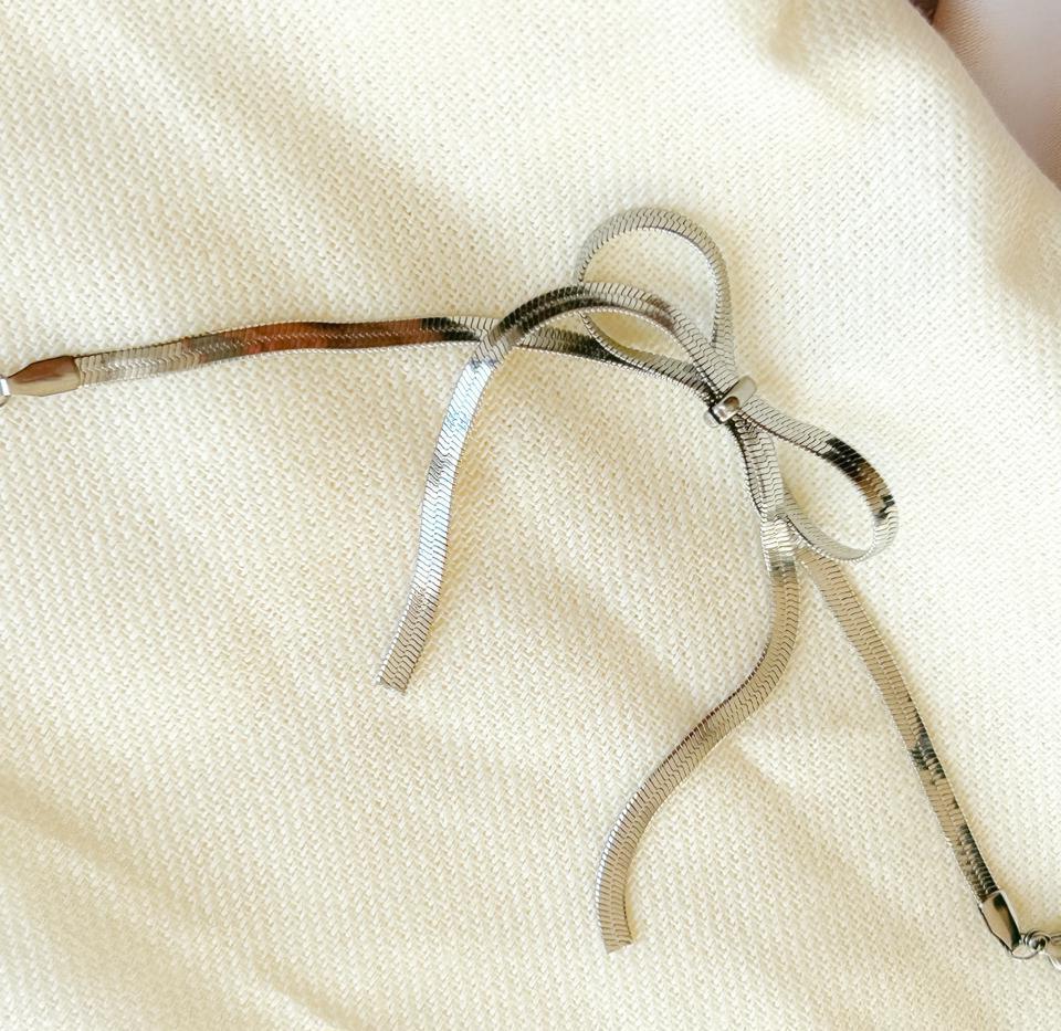 Pulseira laço fita Descrição: Não há.